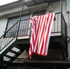 ���}������